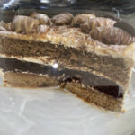 Triple layered vanilla, caramel and coffee cake at Charlie's cafe in Barnstaple, Devon